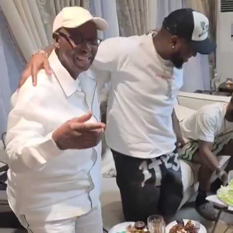 Billionaire Chief Ikuku Gifts Davido Rare Luxury Whisky Worth Millions in Banana Island